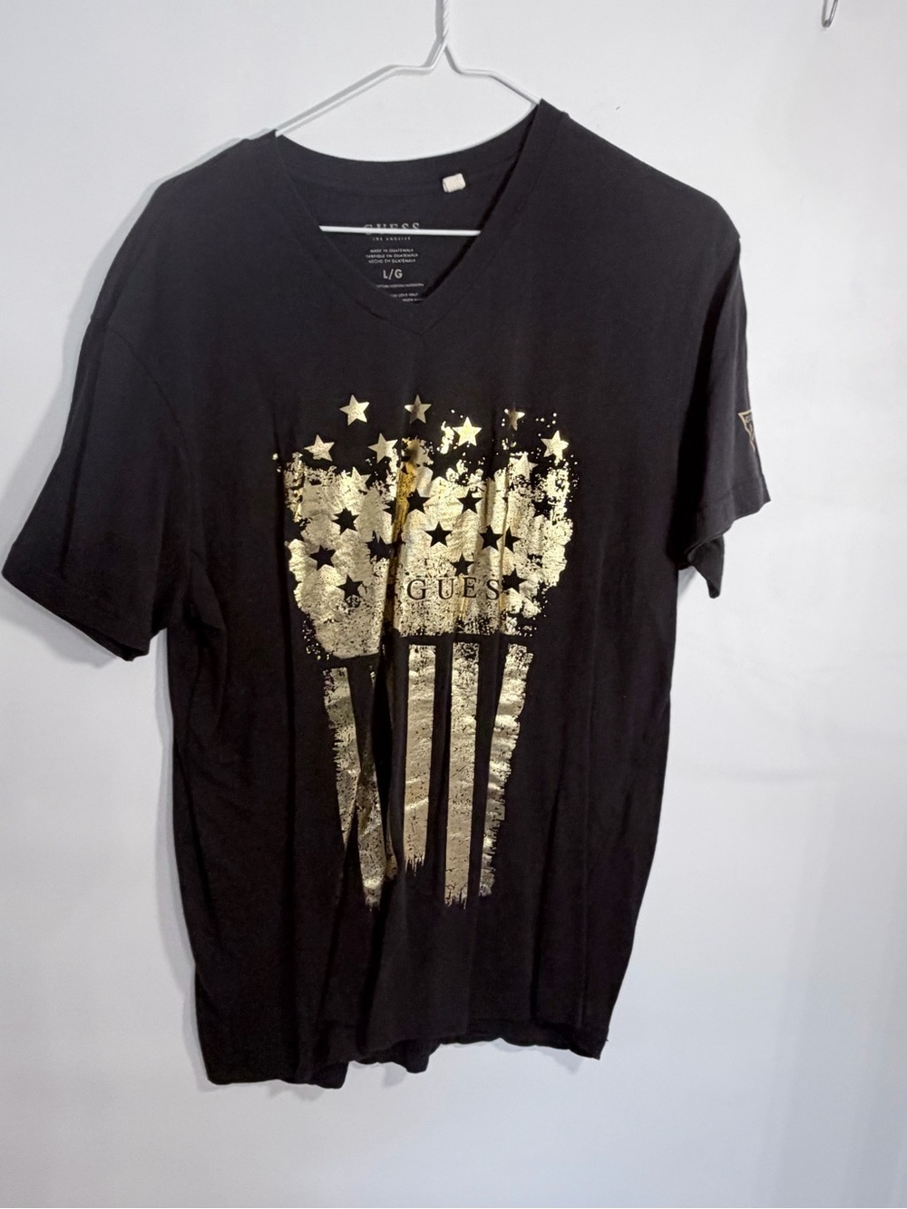 GUESS Black Short-Sleeve V-Neck Tee with Distressed Gold Flag Print